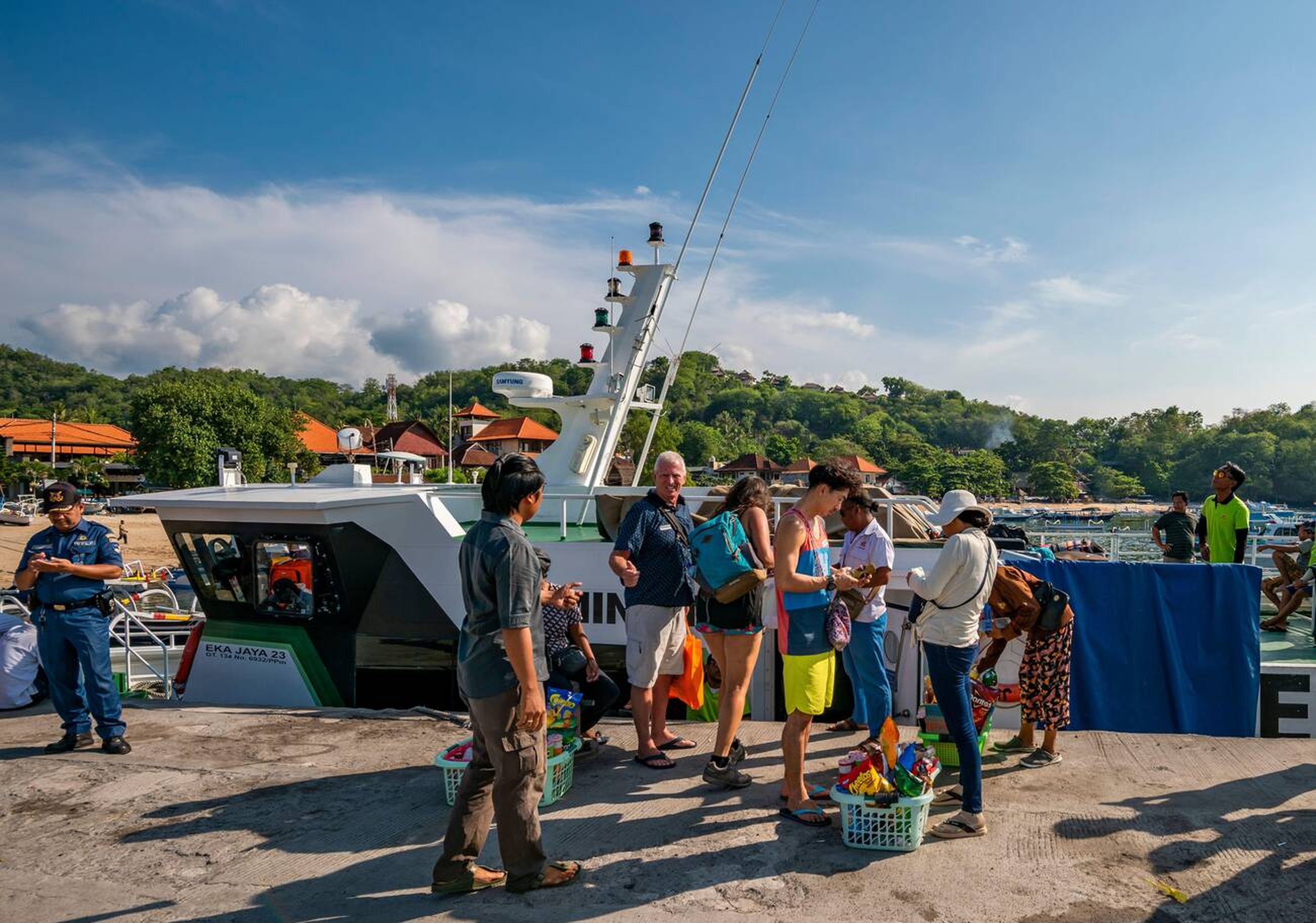 Tourist Waiting to Board the Fast Boat at Padang Bai Harbour, Bali
